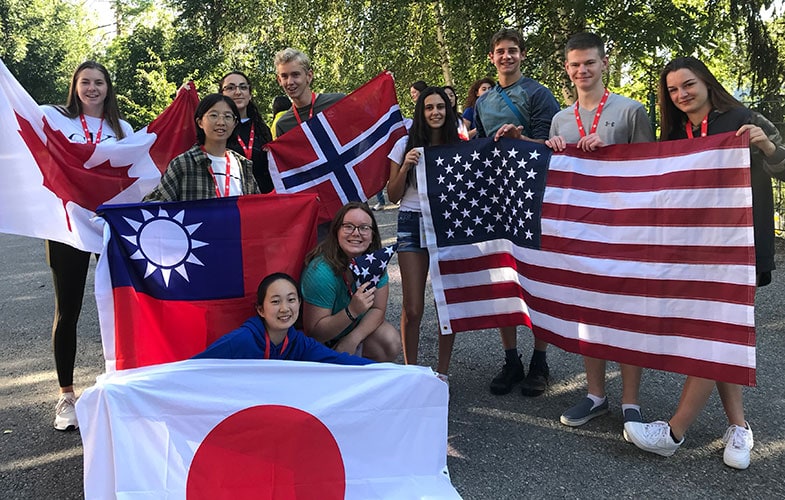 Essex students with flags